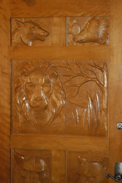 Door with animals carved in it Door with animals carved in it