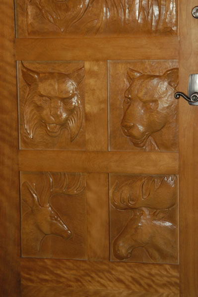 Door with animals carved in it Door with animals carved in it